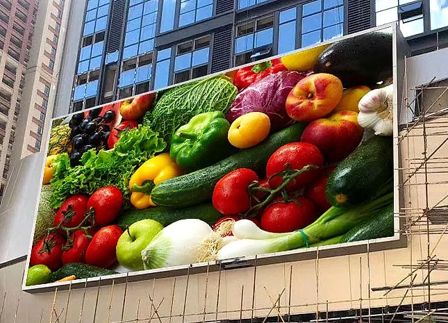 Green Hi-Tech outdoor P5 LED module display installed on a commercial building facade.