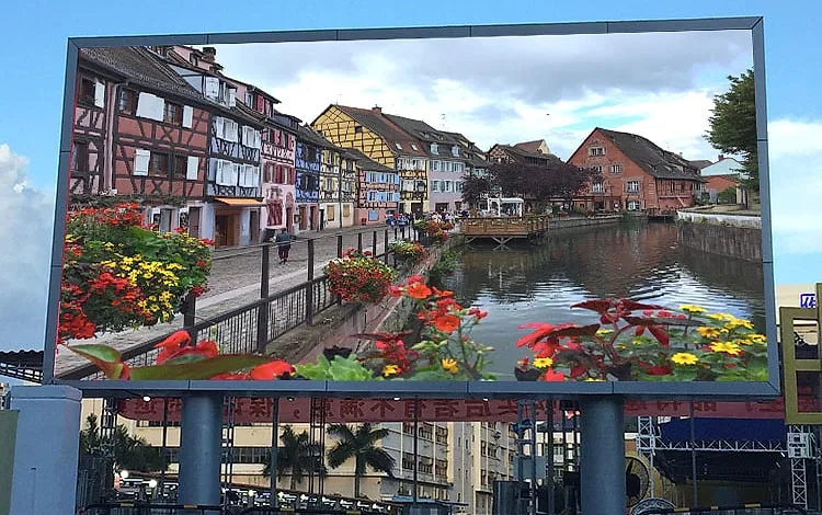 Green Hi-Tech outdoor P2.5 fixed LED display installed on a riverside plaza in Europe.